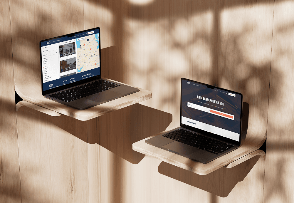 Two laptops on shelves